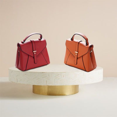 حقيبة يد نسائية بتصميم جذاب مع حمالة اكتاف 